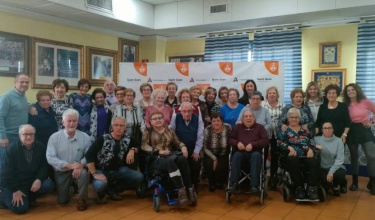 Asistentes a la comida del programa Et motivem