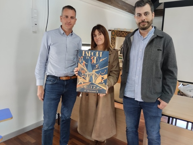 Alberto Belda, Raquel Bonillo i Carles Sansalvador amb el cartell guanyador